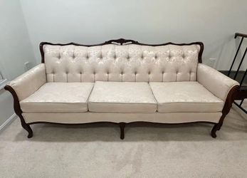 Two Cream Sofas