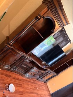 Entertainment center with double pillars