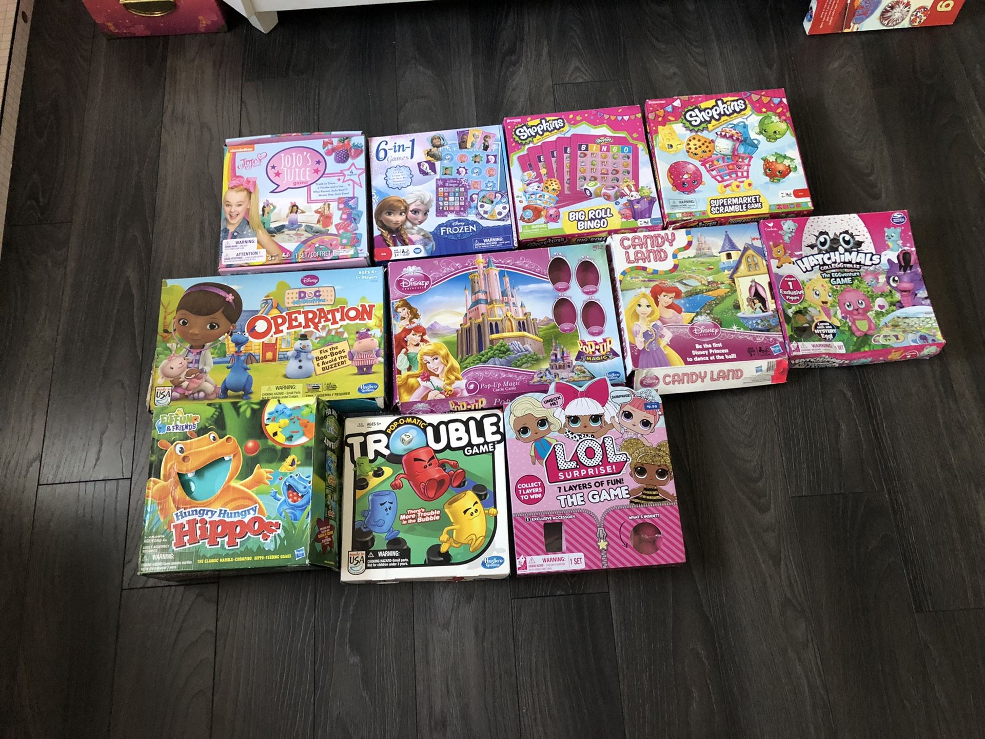 Board games operation, hungry hungry hippo, trouble, LOL surprise game, JoJos juice game, six in one Disney frozen princess games, Shopkins bingo etc