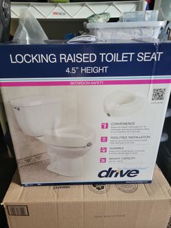 4.5 inch New Raised Toilet Seat Never Used
