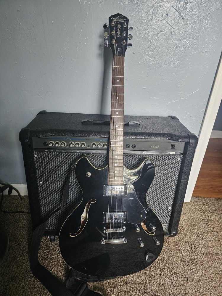 GUITAR CASE AND AMP. $400