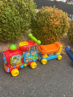Interactive Learning Train and Ride-On Toy with Educational Features