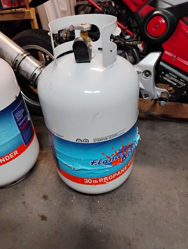 2 7 Gallon Propane Tanks