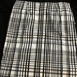 Knee length back and white plaid skirt
