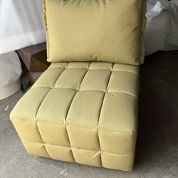 New Faux leather, armless accent chair,  26” wide x 30” deep.  mustard color, very comfortable