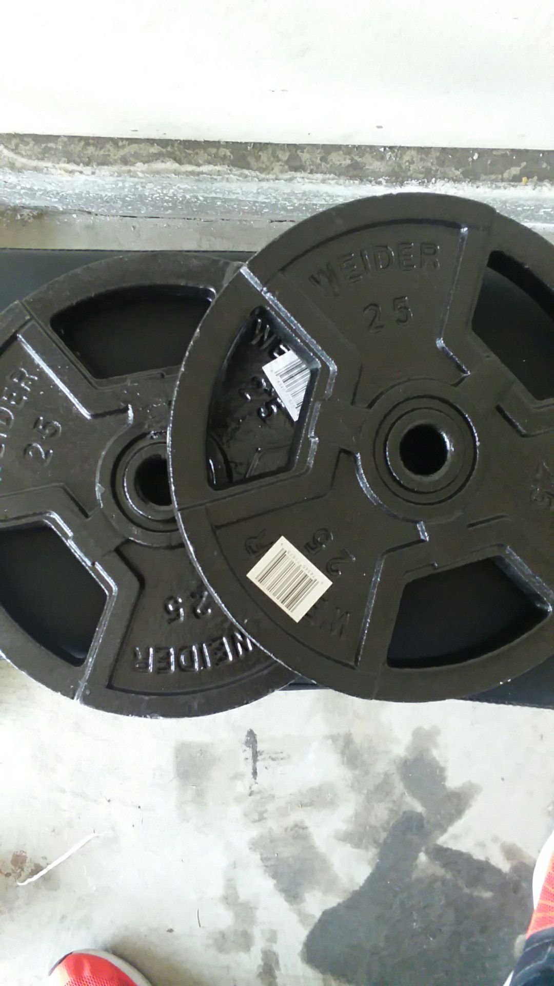 25 lb plates. 1 in holes. Very dense