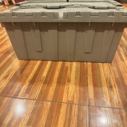 Grey  plastic boxes whit foldable lid