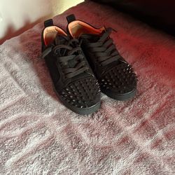 Christian Louboutin (Red bottoms) 