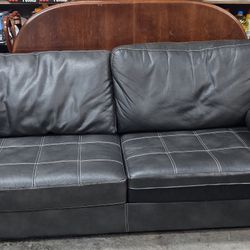 Faux Leather Sofa. 
