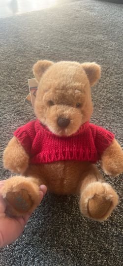 Disney store simply Pooh 12 “ Plush.