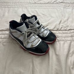 Jordan 11 Retro "Concord" sneakers in white, black, and red #basketball #retro