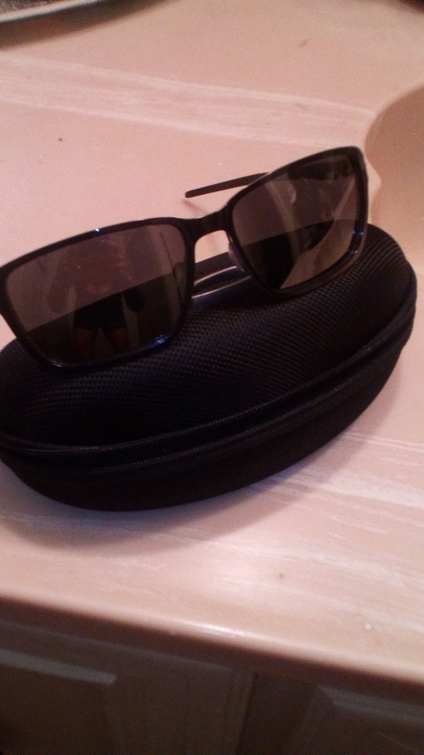 Oakley men's glasses brand new with a case