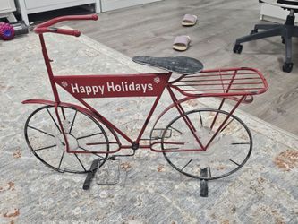 Holiday decorative metal bike.