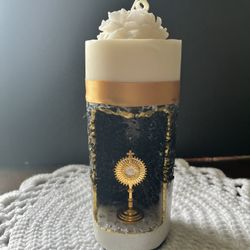 Decorative candle with religious symbol handmade