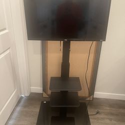 TV STAND WITH TV ( TCL ) ROKU 32”