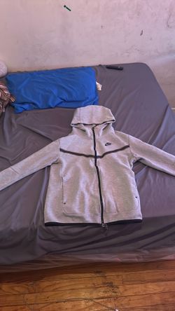 Nike tech jacket a size, medium, and gray