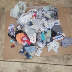 Baby Boy Clothes And Bottles 