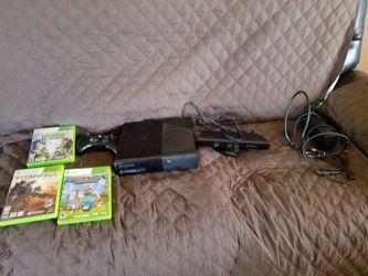 Xbox 360 slim with all cables with a Kinect and 2 extra storages 8gb and 500gb 1controler and 4 games