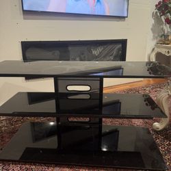 Under TV stand 