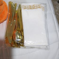 REDUCED....Brand New Plastic Cutlery Set Gold And White 