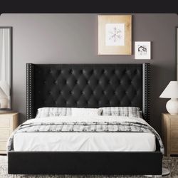 Upholstered Wingback Bed. 