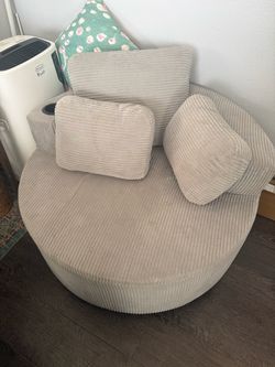 Corduroy swivel chair with ottoman