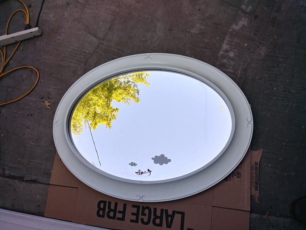 Large oval mirror with beveled edges