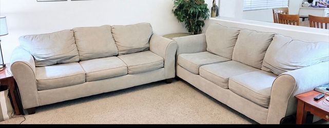 2 beige couches