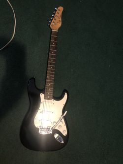 Jay Turser electric guitar, with extras
