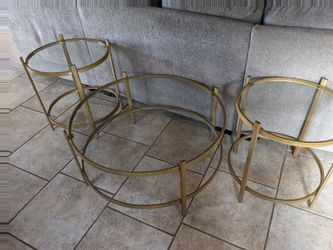 3 table set. One coffee table. Two end tables