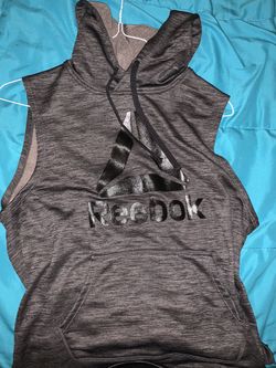 Reebok hoodie with no sleeves, it’s a medium in women.