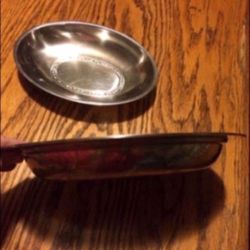 Matching metal oval serving bowl dishes
