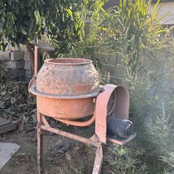 concrete mixer, also known as a cement mixer. 