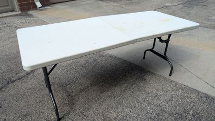 Folding table with wheels