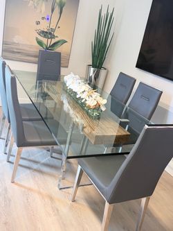 Glass Dining Table with 6 Gray Chairs