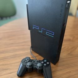 Playstation 2 w/500 + Games Trade OK