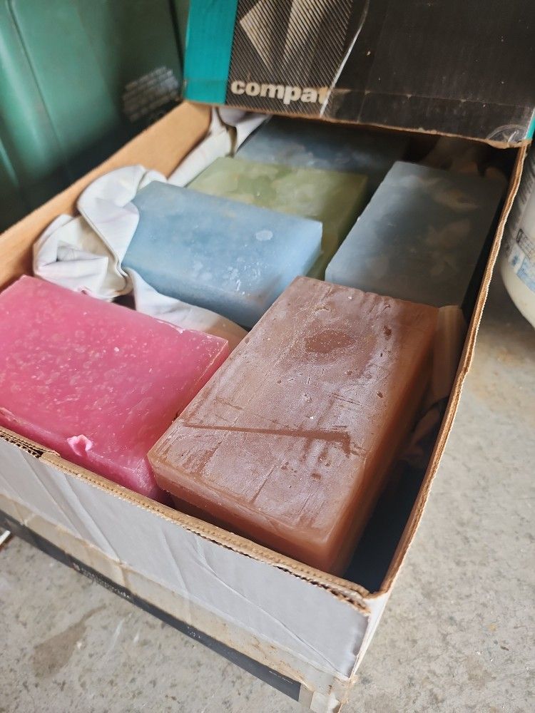 a case of wax bars for making candles