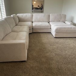 Light Beige Sectional Sofa With Oversized Chaise