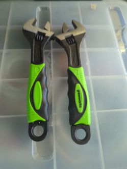 Two adjustable wrenches