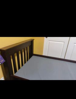Twin wooden beds