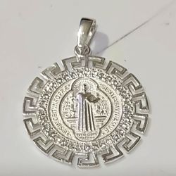 Sterling silver saint pendant. 