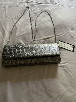 It’s A Brand new clutch the color is metallic it is from expressions NYC Never been used