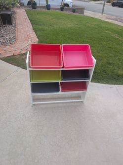Storage rack with bins