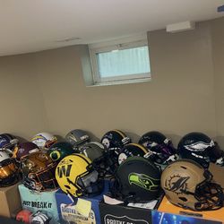 Signed Helmet And  Jerseys 