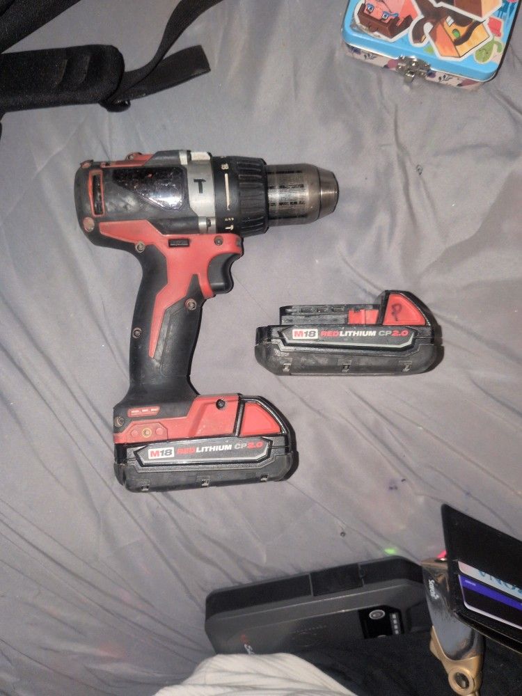 Milwaukee M18 Hammer Drills And Two Batteries 