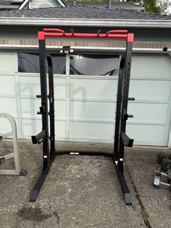 Squat rack with pull up bar, spotter arms, pull up bar