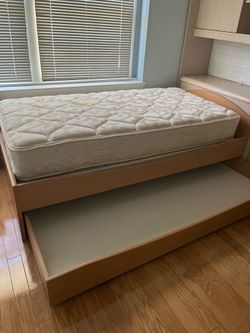 Bed with a big storage, bunkie board and new mattress.