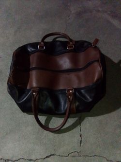 BLACK & BROWN LEATHER DUFFLE BAG