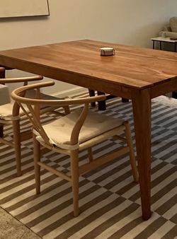 Two wishbone chairs With Seat Cushions