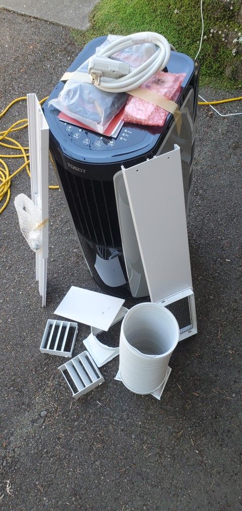 Air Conditioner Portable New in the box with Built-In Dehumidifier small footprint By TOSOT